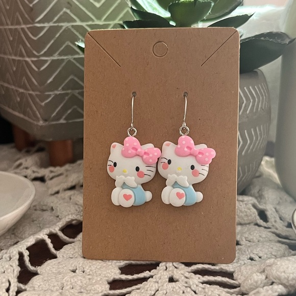 *3 for $20* Sanrio Blushing Hello Kitty Earrings - Picture 1 of 4